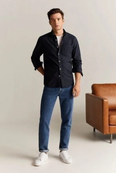 Black Shirt with Blue Jeans